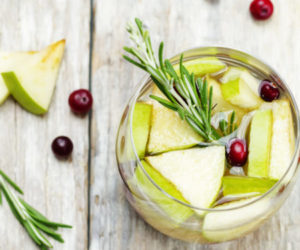 Apple Cranberry Rosemary sangria. toning. selective focus